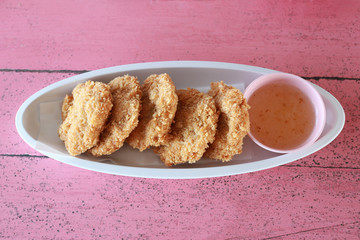 Fried shrimp Cake in white dish.