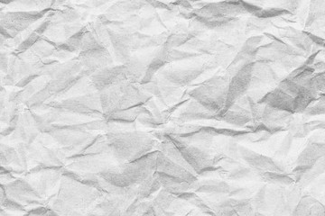 Crumpled white paper texture background.