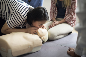 Obraz na płótnie Canvas CPR First Aid Training Concept