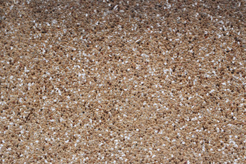 surface of stone mix cement wall.