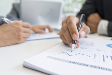 Business people and colleagues discussion with business document at meeting room,  teamwork concept, discussing concept