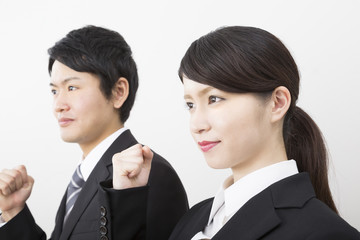 ビジネス男女　ガッツポーズ