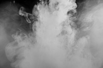 Beautiful storm cloud isolated on black background. Smoke from cigarettes. Vape.