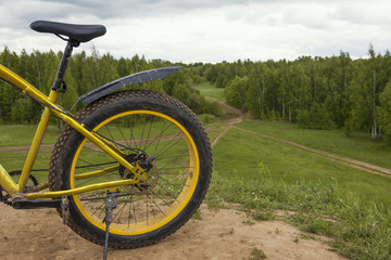 Fototapeta na wymiar Bicycle sport background - dirty fat-bake outdoor
