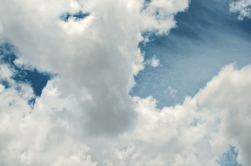 Clouds in the blue summer sky.