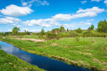 Fototapeta na wymiar Panorama of the village of Mikhailovskoye in a Sunny spring day.