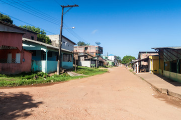 Fototapeta na wymiar OIAPOQUE, BRAZIL - AUGUST 1, 2015: View of a street in Oiapoque town.