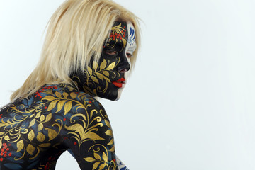 Body art of a girl in the style of Khokhloma and Gzhel