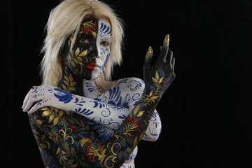 Body art of a girl in the style of Khokhloma and Gzhel