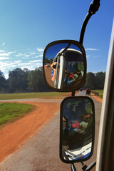 selfie in the rearview mirror