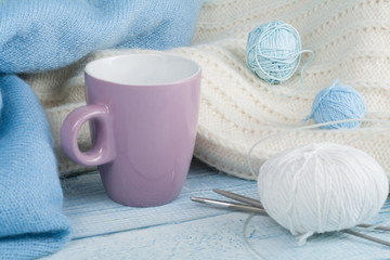 Handmade gift for special day as mother day, father day, valentine day or wintertime, heap of ball of wool to knit colorful scarf for cold day, knitting to make special meaningful vintage blue present