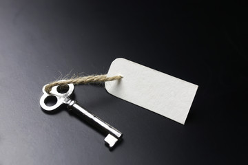 bell and the key at the reception in the hotel