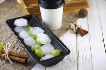 Dessert chocolate ice cream with nuts on wooden stick