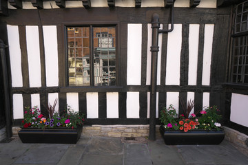 Fototapeta na wymiar Flowers on Chapel Street of Stratford-upon-Avon