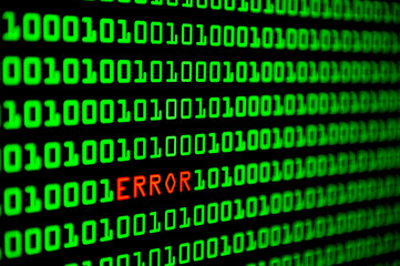 Close up of binary code infected by computer virus.