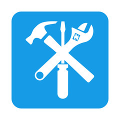 Icono plano herramientas en cuadrado azul