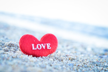 Fototapeta premium Close up of heart on the beach in beautiful