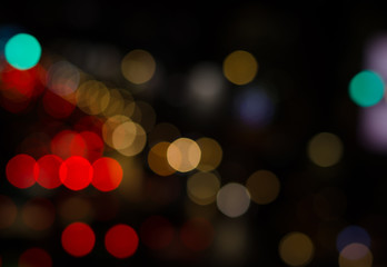 Bokeh street light background in night.Red tone blur bokeh light background.