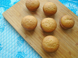 Ruddy muffins on the board