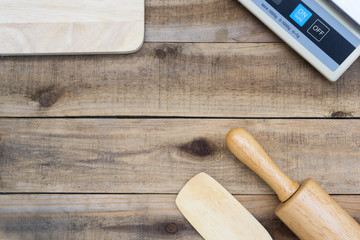 Wood bakery tool with  digital scales on wood table