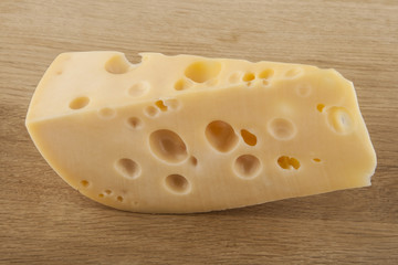 Cheese on a wooden background