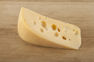 Cheese on a wooden background