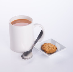 coffee or coffee with cookies on background.