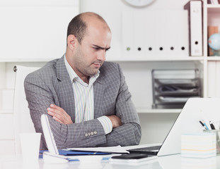 Naklejka premium Sad businessman thinking about work