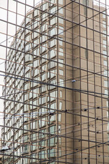 Building Reflected in Glass Wall