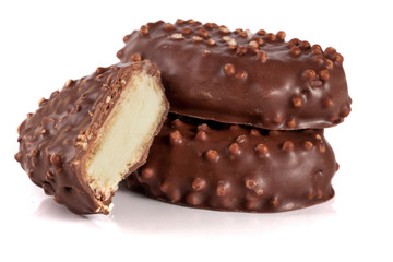 chocolate candy with white cream filling isolated on white background
