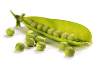 Pods of green peas isolated on a white background. Green ripe fresh vegetables. Legumes.