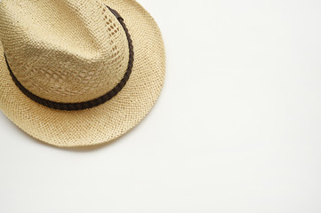 Summer straw hat isolated on white background © thananya_k