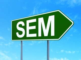 Marketing concept: SEM on road sign background