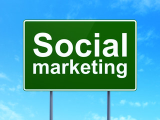 Advertising concept: Social Marketing on road sign background