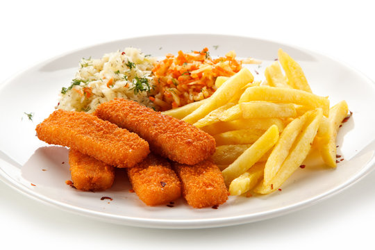 Fried fish sticks with french fries on white background