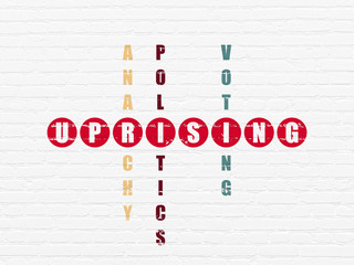 Politics concept: Uprising in Crossword Puzzle