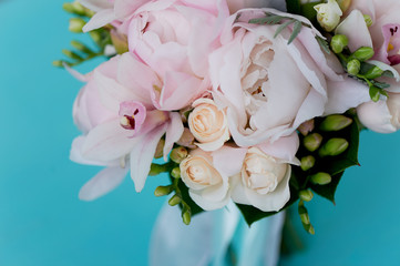 The bride's bouquet of soft pink peonies and white roses . Wedding floristry. Classic form
