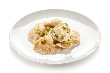 Dumplings - stuffed cheese noodles on white background