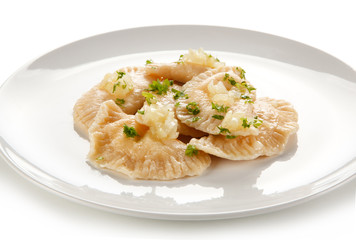 Dumplings - stuffed cheese noodles on white background