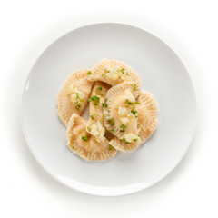 Dumplings - stuffed cheese noodles on white background