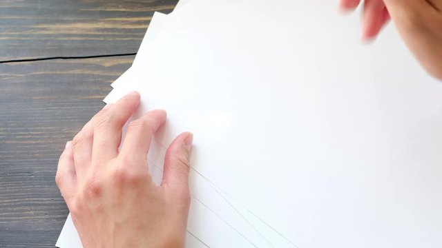 Female hand writing a word (OK)