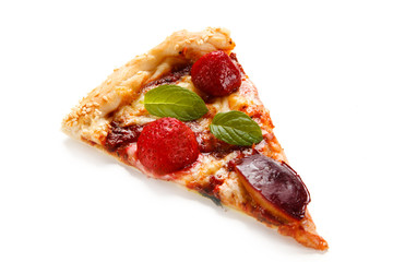 Pizza with plums and strawberries on white background