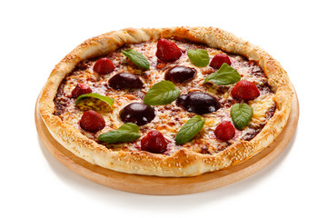 Pizza with plums and strawberries on white background