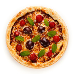 Pizza with plums and strawberries on white background