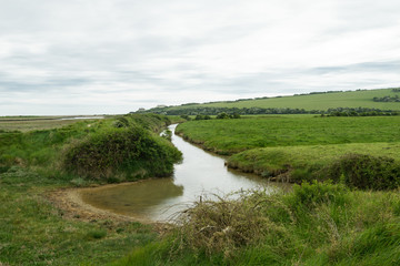 Fototapeta na wymiar Paesaggio inglese - Foce del fiume Cuckmere