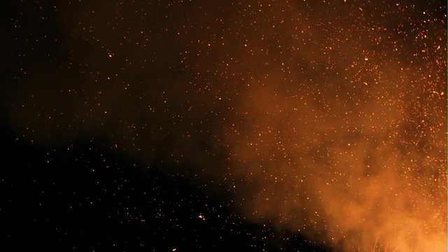 Glittering stars on bokeh background sparks of bonfire night