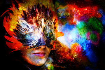 Young woman with feather carnival face mask. Goddess woman goddess in cosmic space.