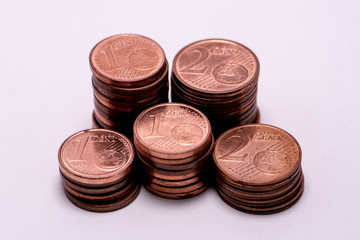 stacks of euro cents, one and two cents value