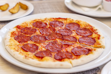 pepperoni pizza, selective focus.