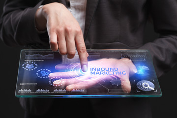 The concept of business, technology, the Internet and the network. A young entrepreneur working on a virtual screen of the future and sees the inscription: Inbound marketing